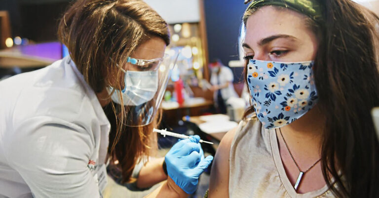 vaccine-woman-breast-cancer-surge